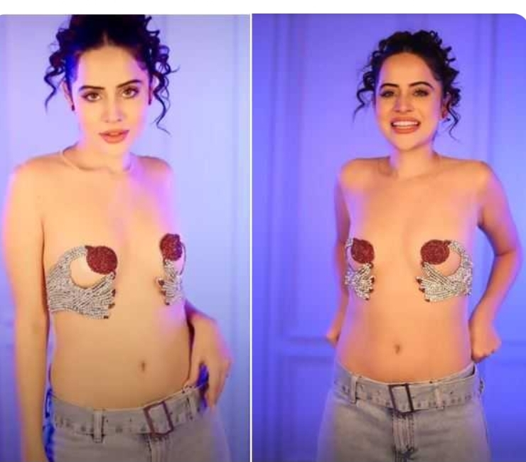एक बार फिर टॉपलेस नज़र आयी  हाथों से ढका जिस्म